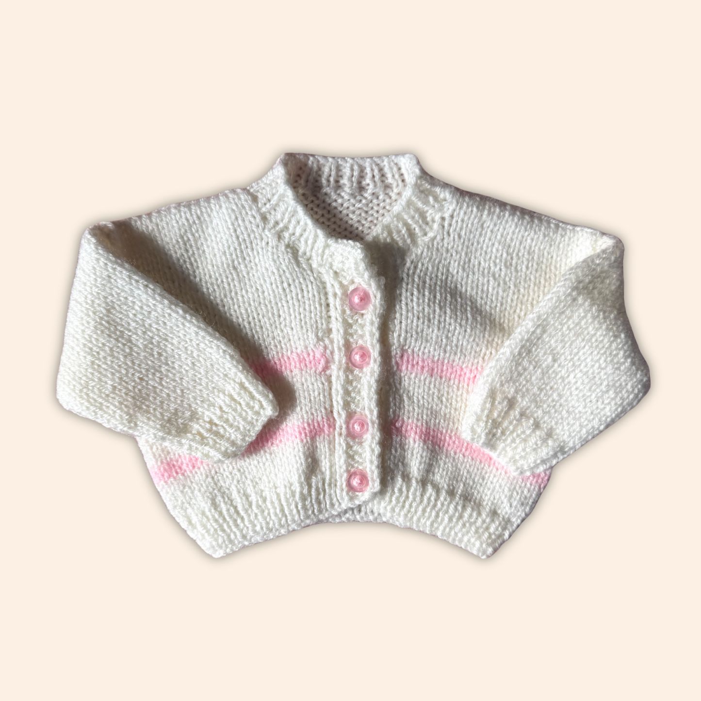 pink and white newborn hand knit cardigan
