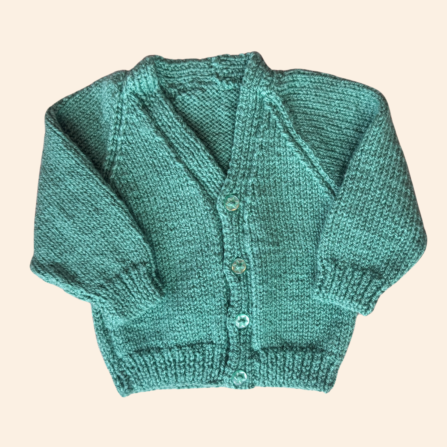 pale turquoise 0-3 month hand knit cardigan