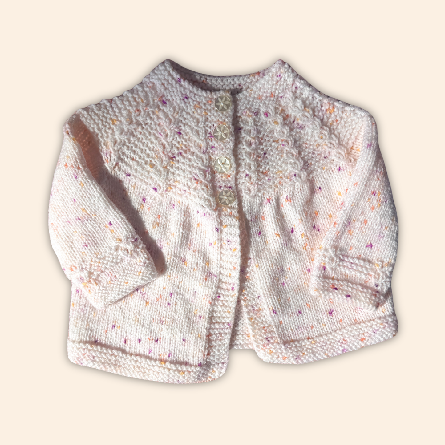 soft peach fleck 6-12 months hand knit cardigan