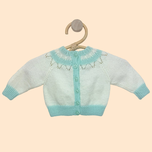 white newborn hand knit cardigan