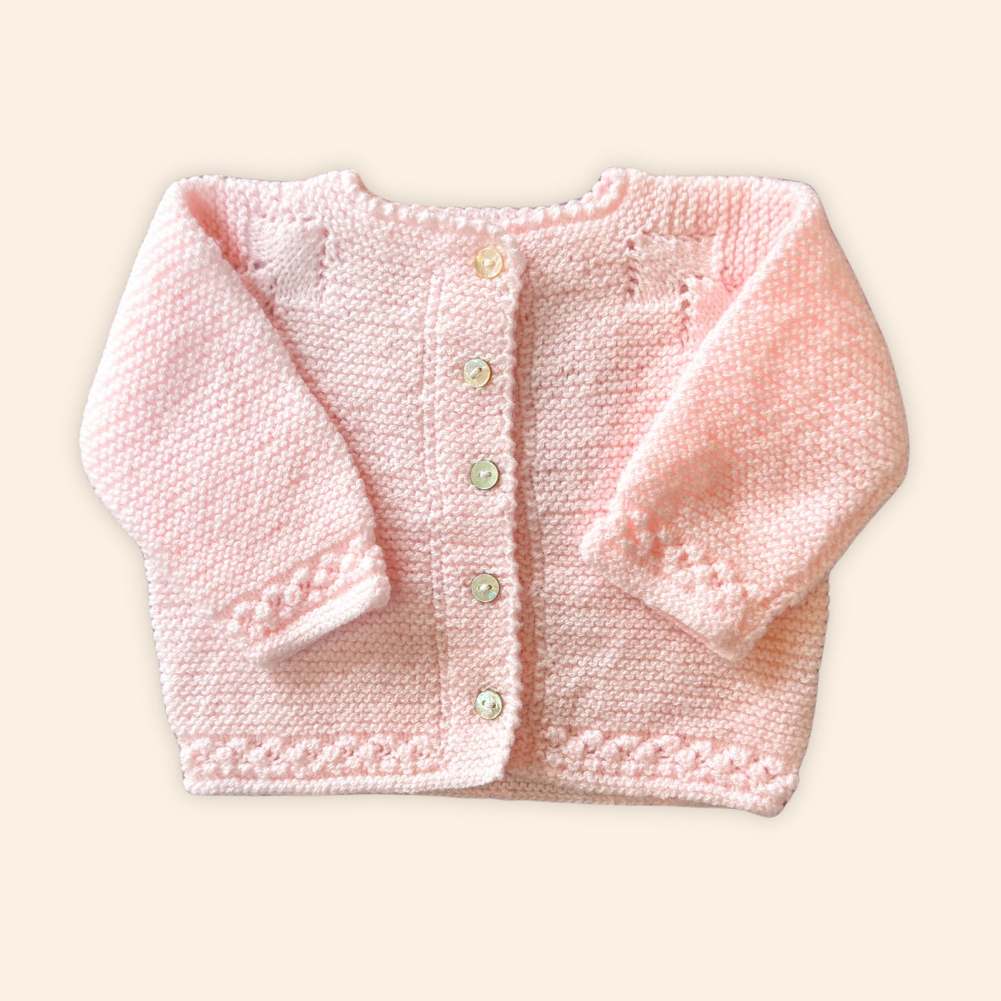 soft pink newborn hand knit cardigan