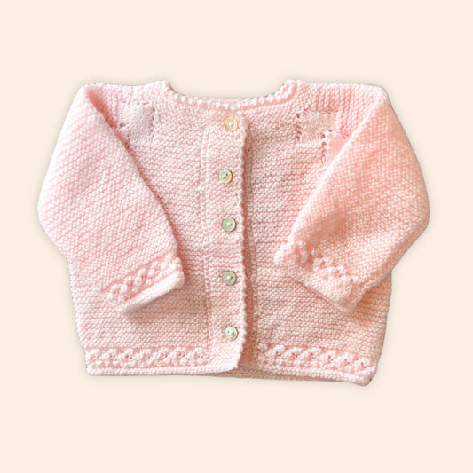 soft pink newborn hand knit cardigan
