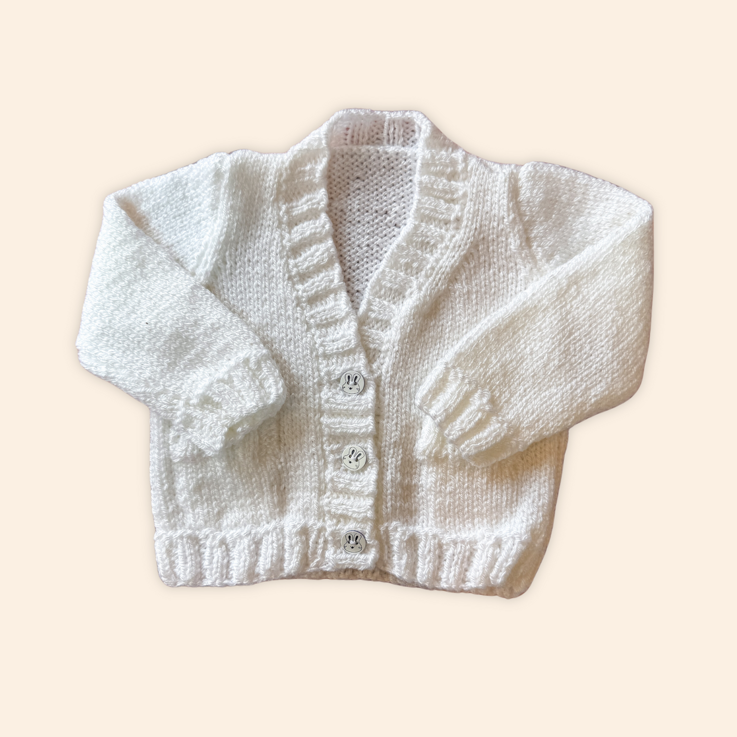 white 0-3 month hand knit cardigan