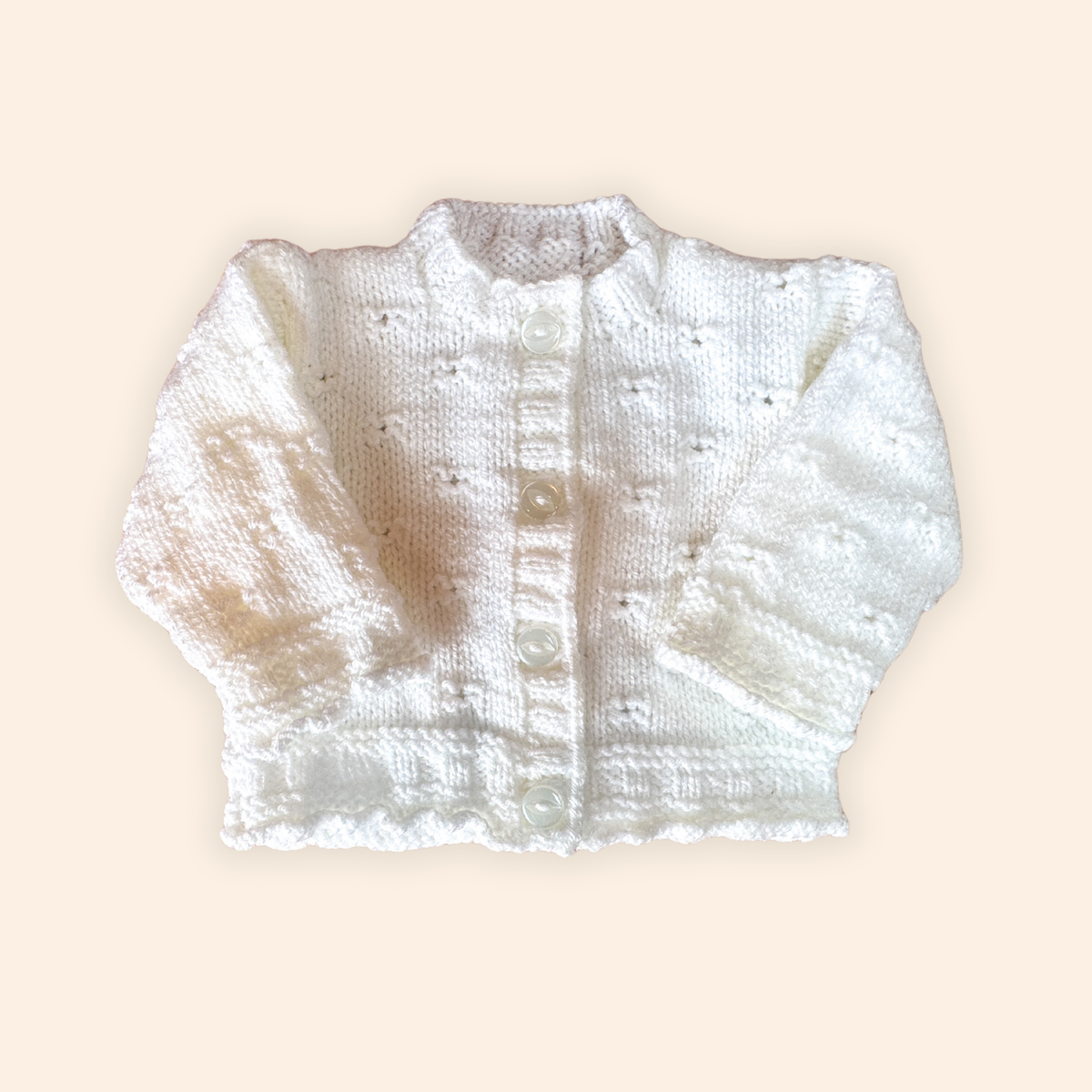 white 0-3 month hand knit cardigan
