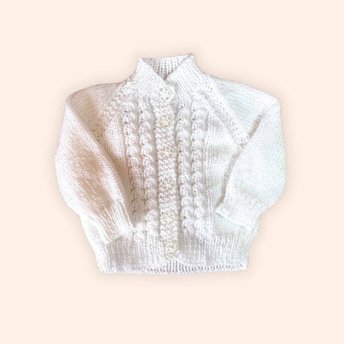 white 0-3 month hand knit cardigan