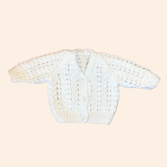 white newborn hand knit cardigan
